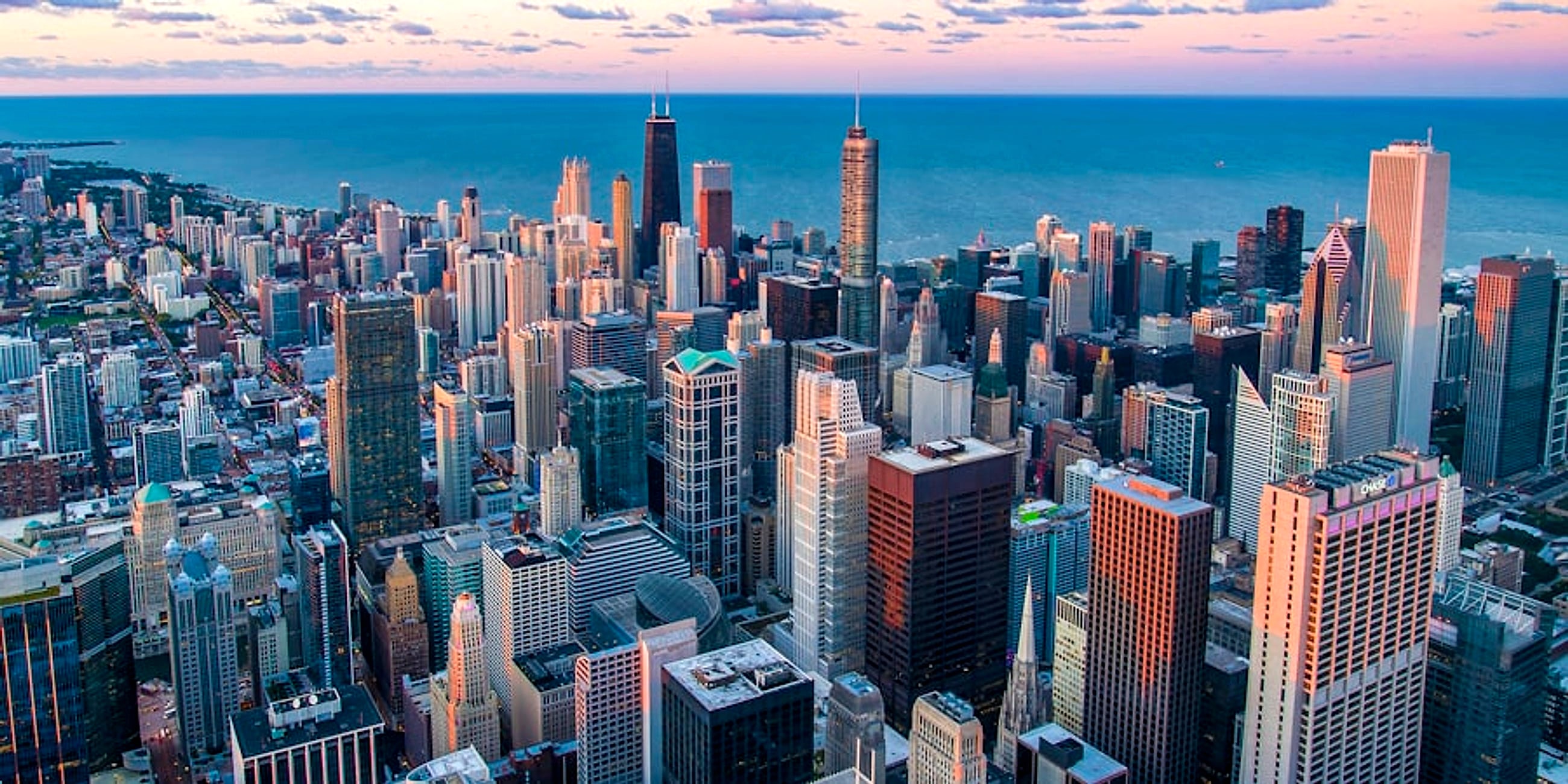 Aerial view of an American city skyline at golden hour